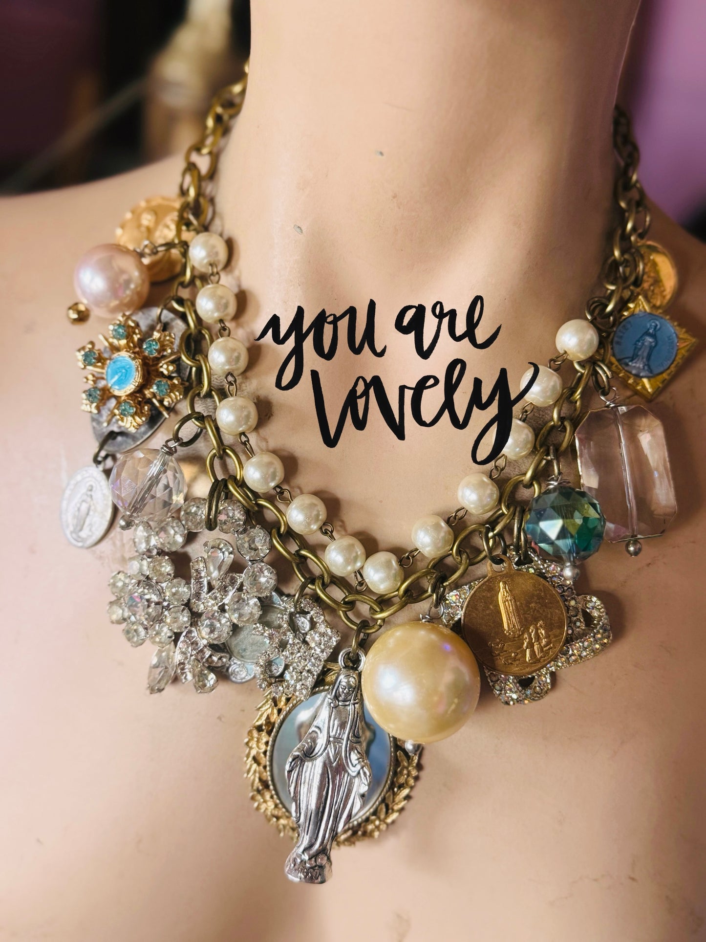 Vintage religious piece necklace with hints of blue